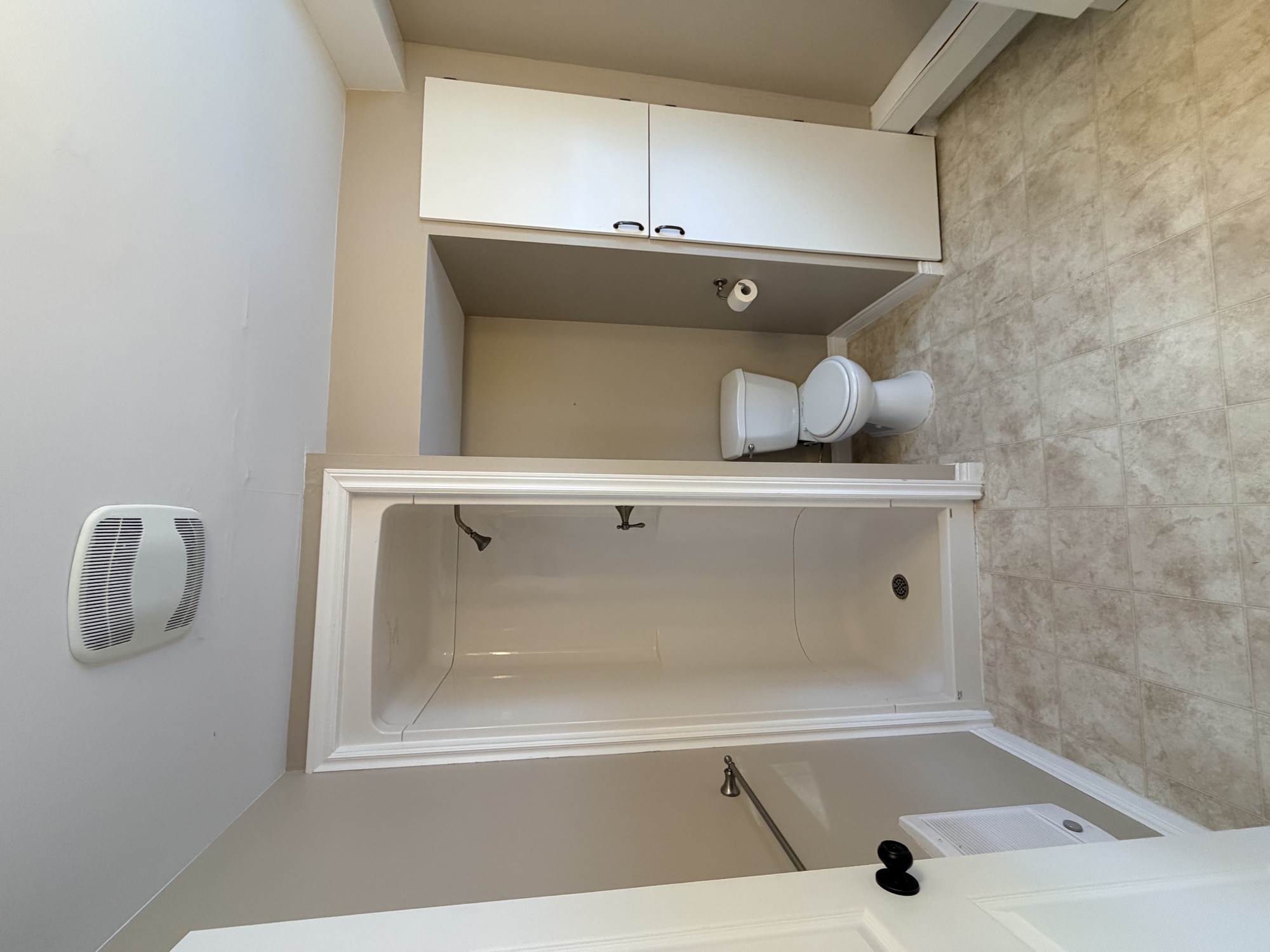 Bathroom renovation before replacing shower for a tub.