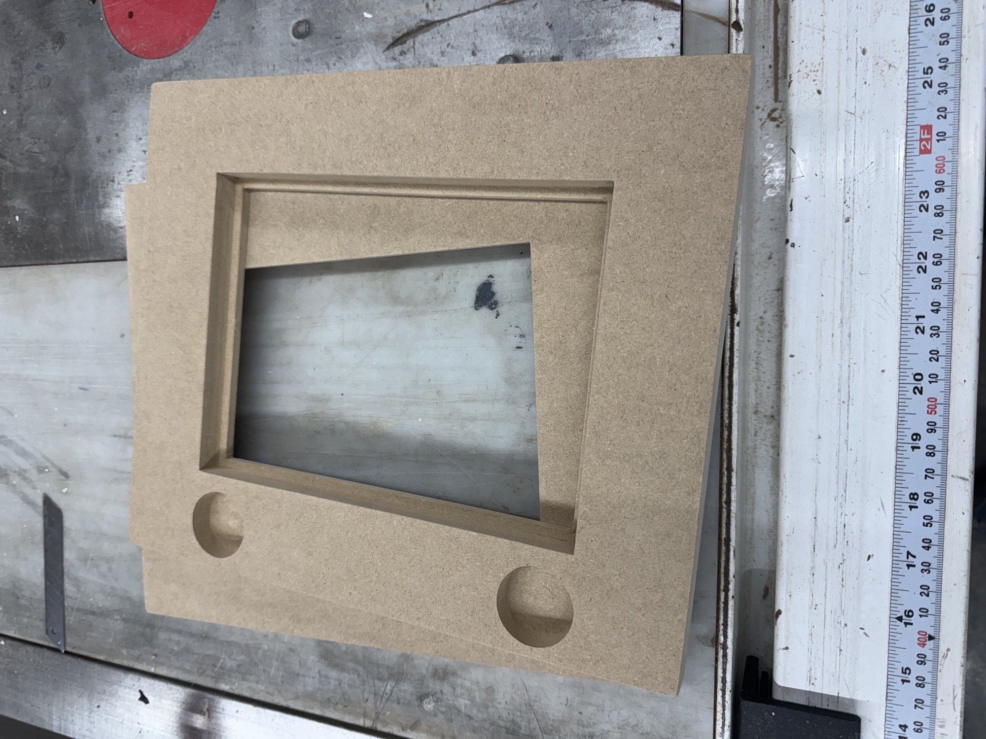 Cabinet door profile sample during refinishing prep.